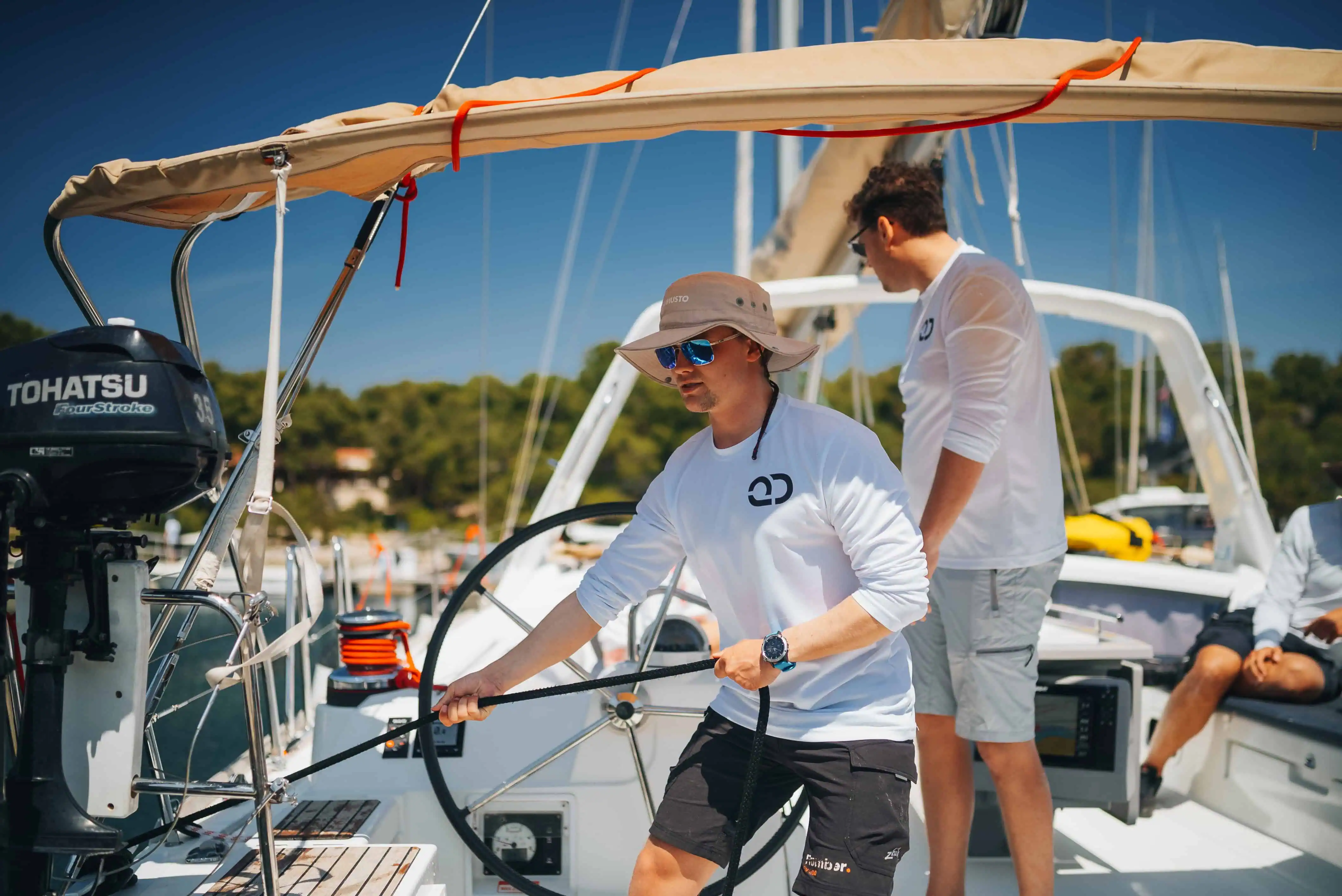 Practical sailing instruction during sailing academy course