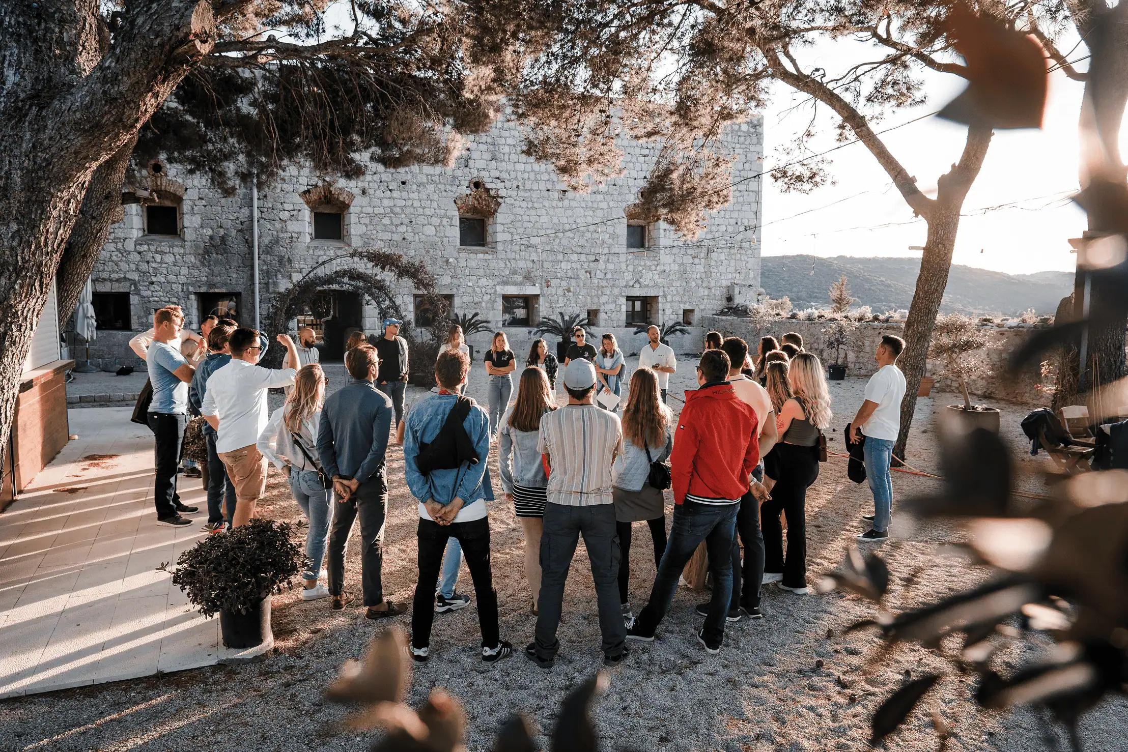 Sailing academy students gathered for a training briefing