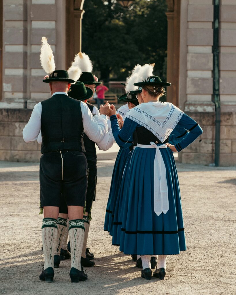 Couple enjoying Oktoberfest in borrowed traditional clothing