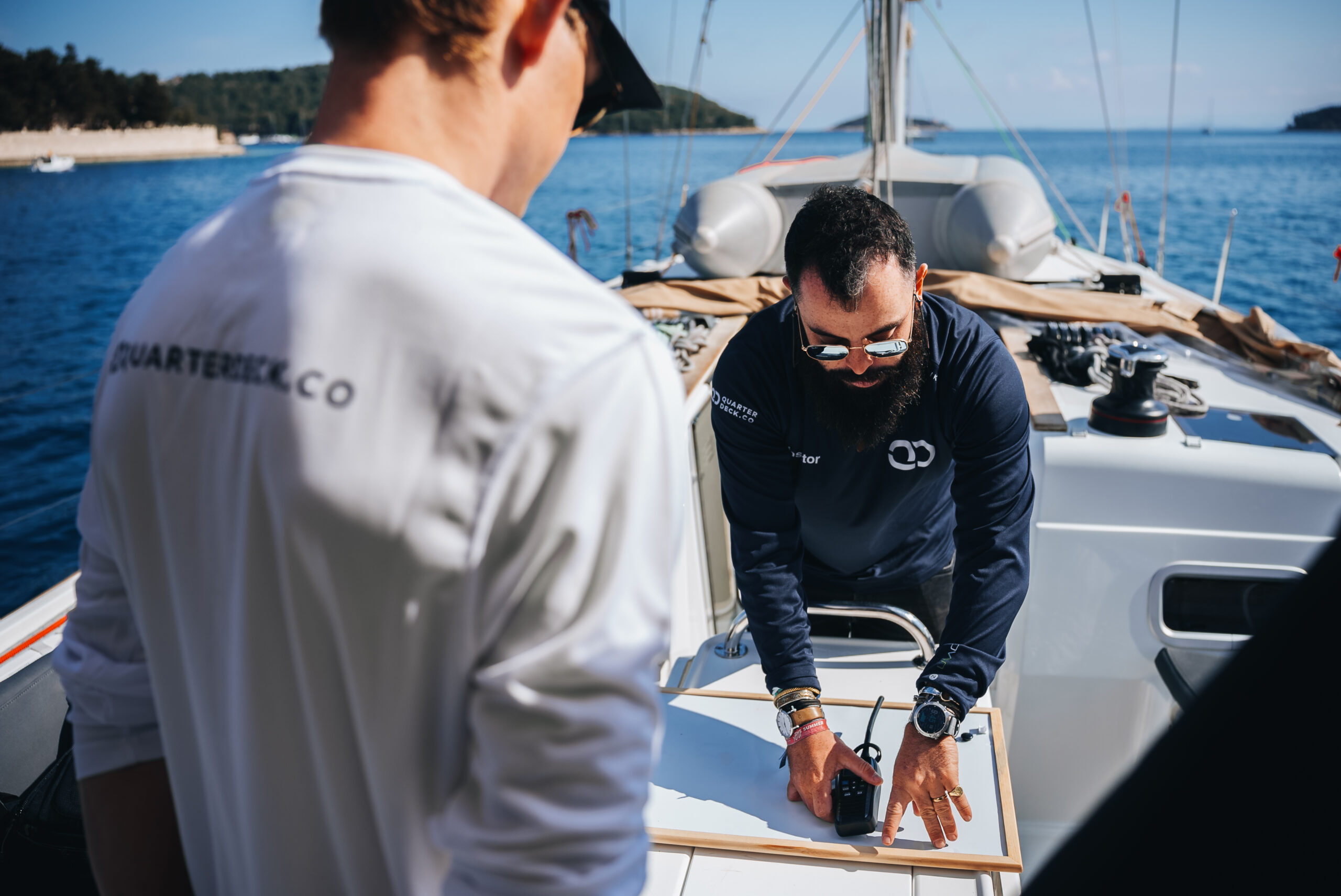Sailing instructor explaining navigation during skipper training