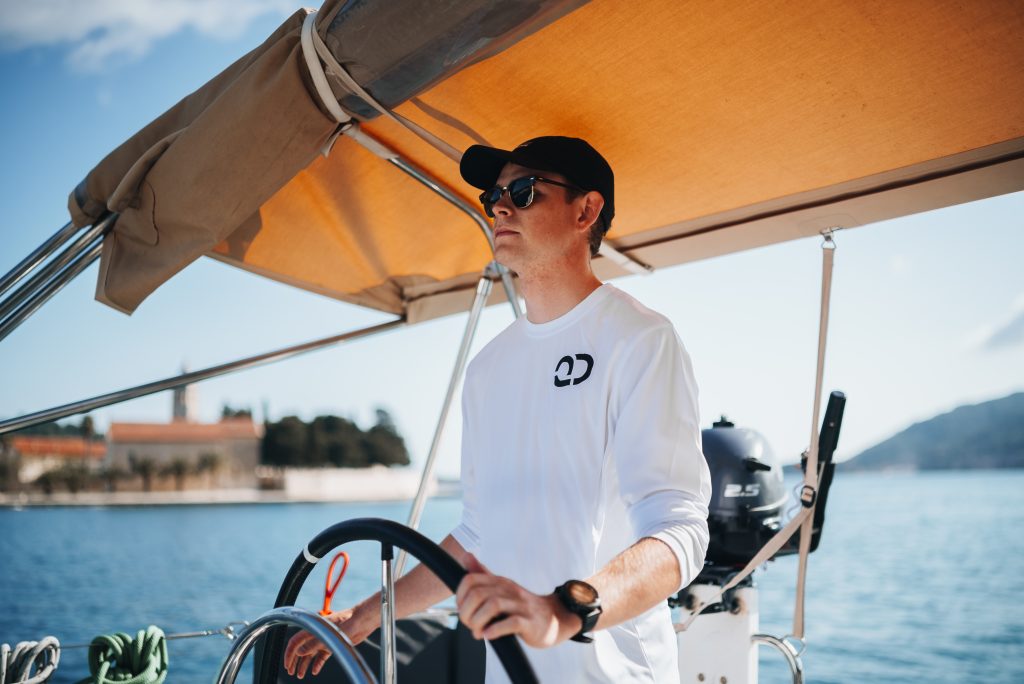 Licensed yacht skipper operating a sailing yacht at sea
