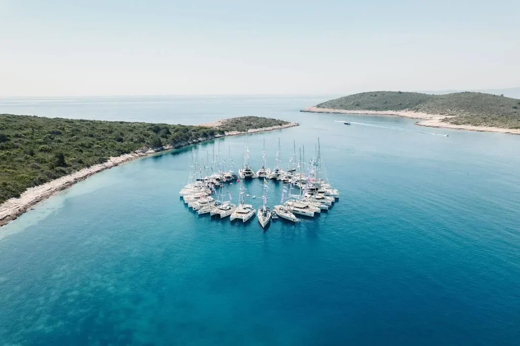 Aerial view of charter yachts gathered at sea